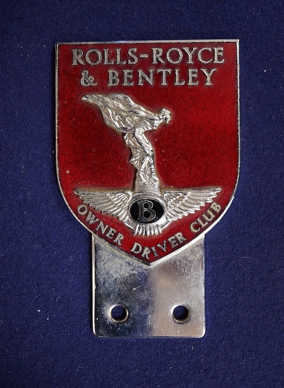A Rolls Royce and Bentley Owner Driver Club chrome and enamel car radiator badge, 10.7 x 6.6cm. Condition - fair to good.
